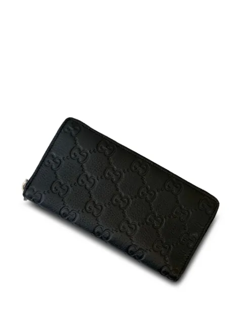 Gucci cartera con monograma GG y cierre