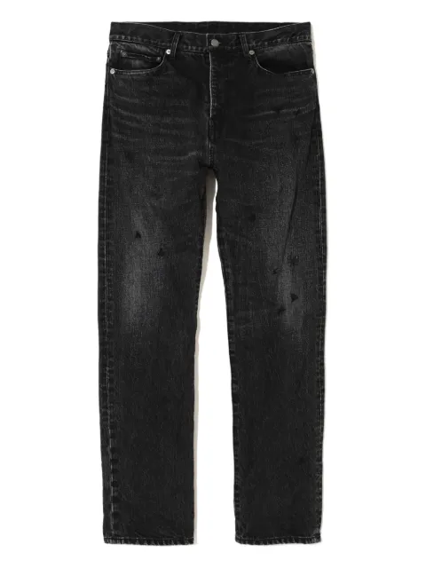 Undercover spider-embellished jeans