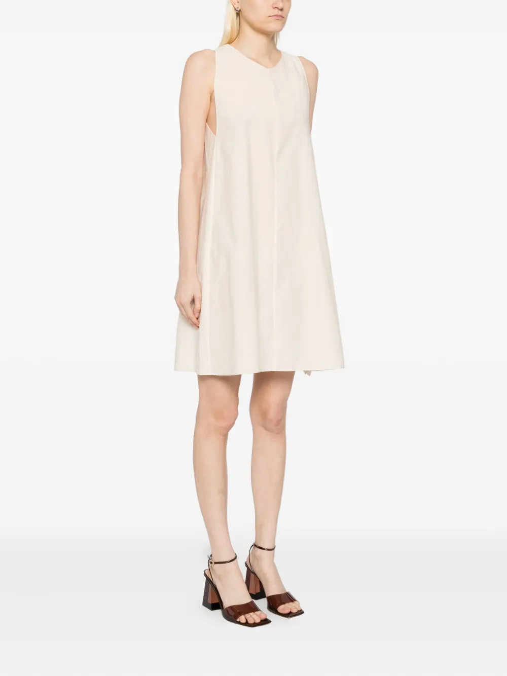 KHAITE Mouwloze jurk Beige