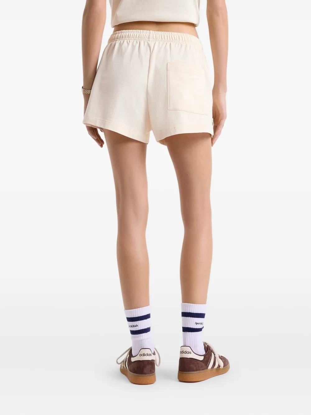 Sporty & Rich Lion Health Disco shorts Beige