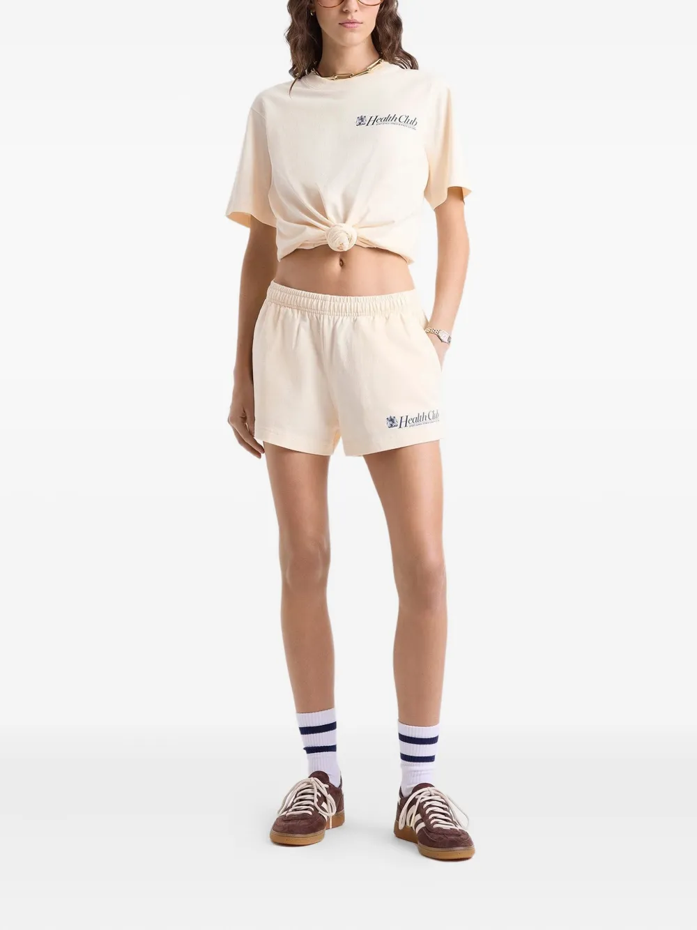 Sporty & Rich Lion Health Disco shorts Beige