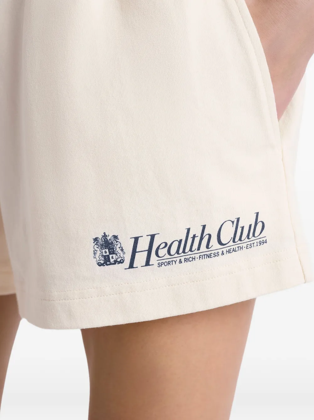 Sporty & Rich Lion Health Disco shorts Beige