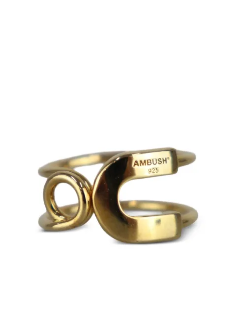 AMBUSH دبلة بتصميم مزدوج وزينة دبوس