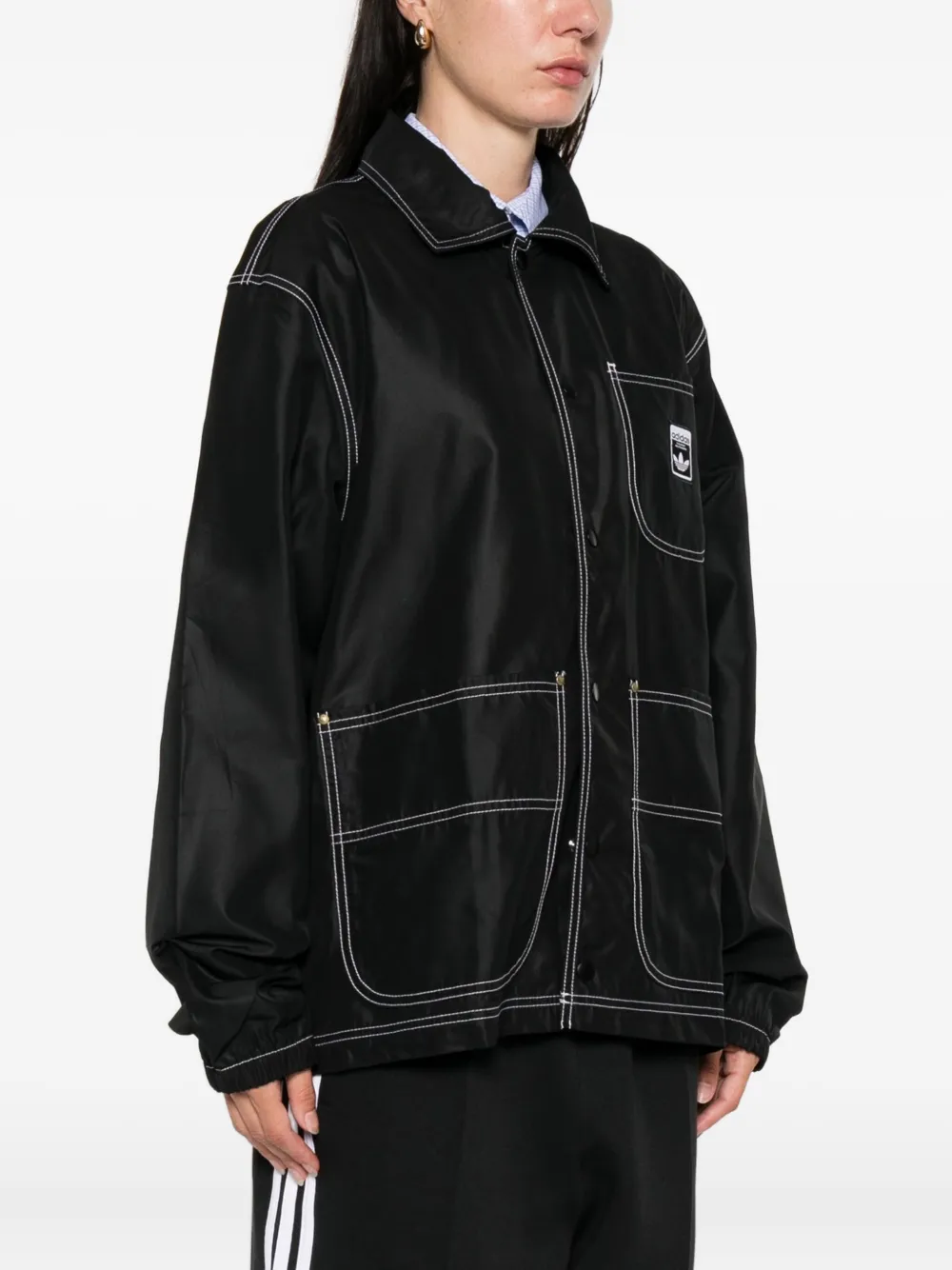 adidas Shirtjack met contrasterend stiksel en zakken Zwart