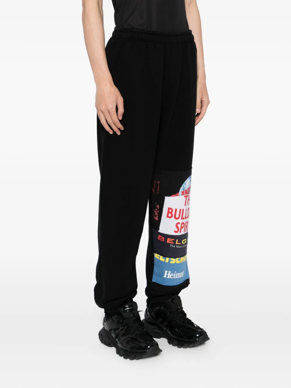 VETEMENTS graphic-print trousers Zwart