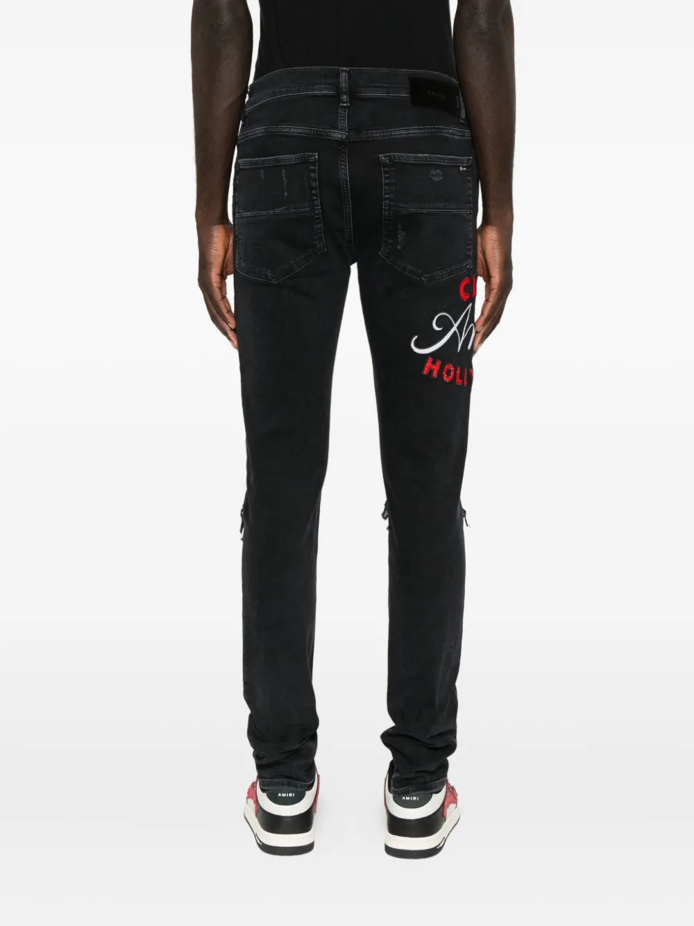 AMIRI Gerafelde jeans met borduurwerk Zwart