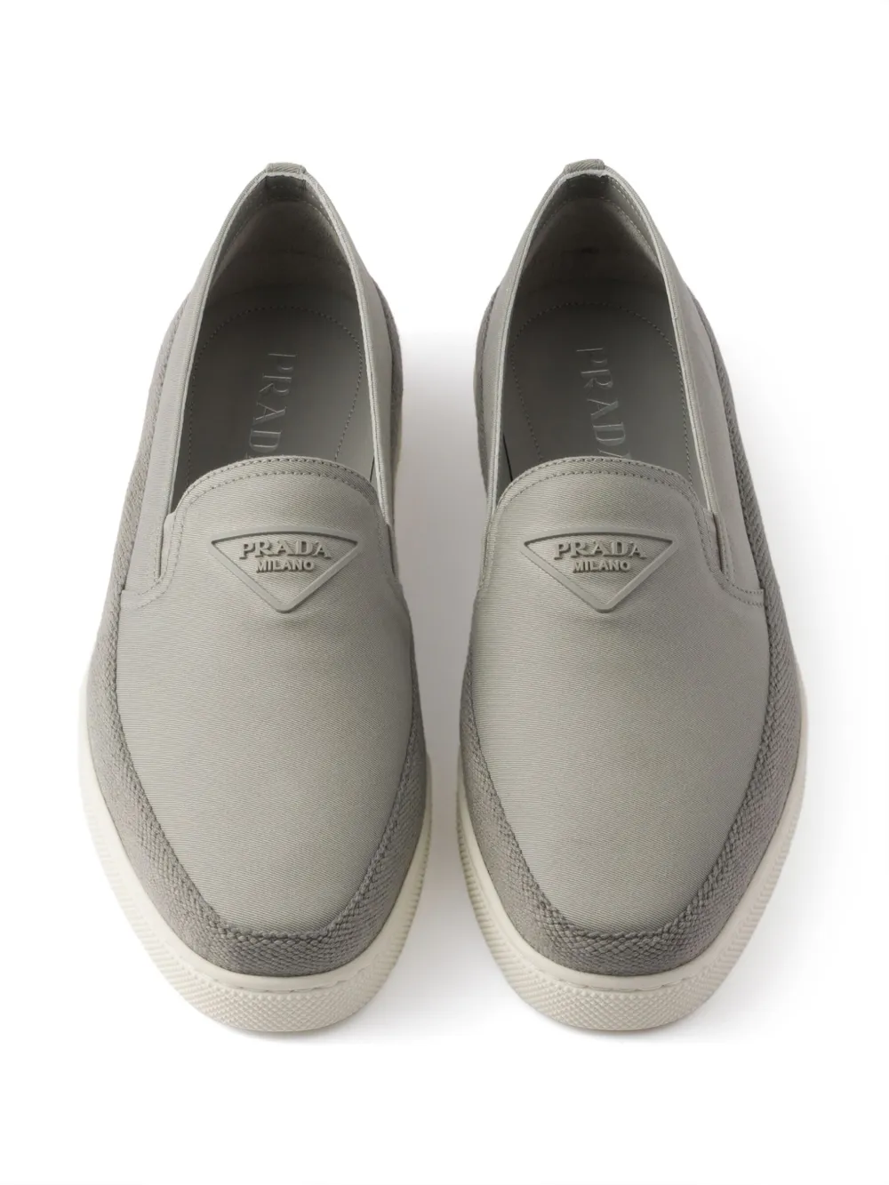 Prada embossed-logo slip-on Grey