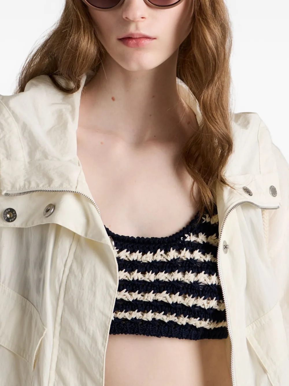 Prada Eyewear Zonnebril met cat-eye montuur en driehoekig detail Bruin