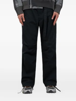 Sacai x Hank Willis Thomas Patchwork Trousers | Black | FARFETCH