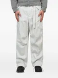 sacai cargo-pocket trousers - White