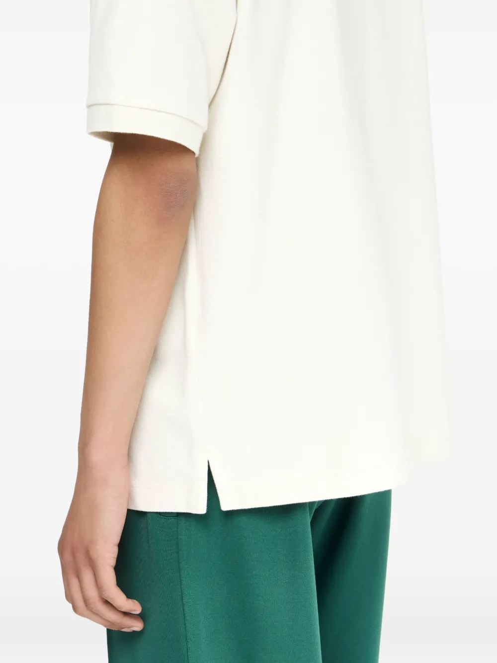 JW Anderson Poloshirt met geborduurd logo Beige