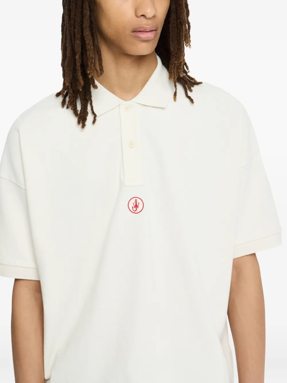 JW Anderson Poloshirt met geborduurd logo Beige