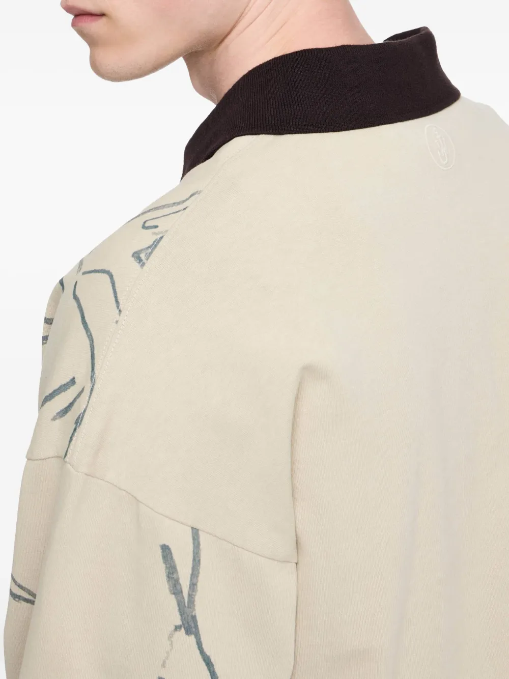 JW Anderson Poloshirt met illustratie en halve rits Beige