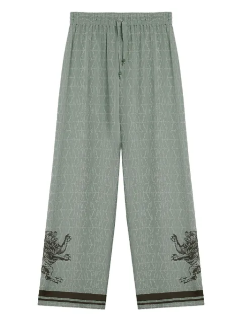 DDA lion-embellished patterned silk trousers