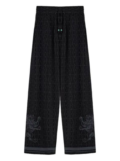 DDA lion-embellished patterned silk trousers