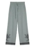 Domaine Des Artistes lion-embellished geometric-print pants - Blue