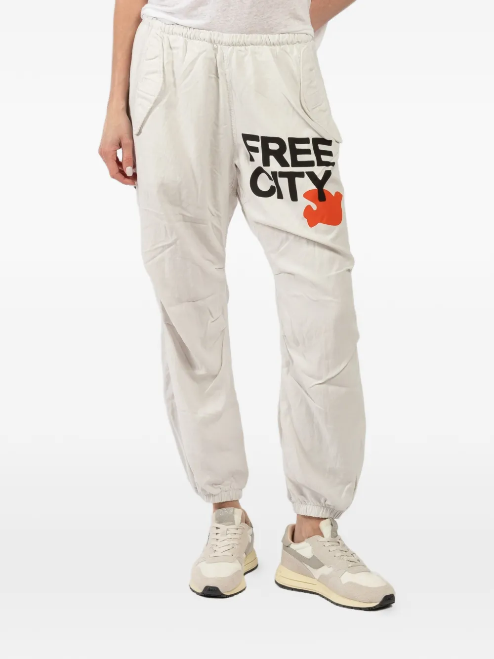 FreeCity elastic-waistband logo-print track pants - Toni neutri