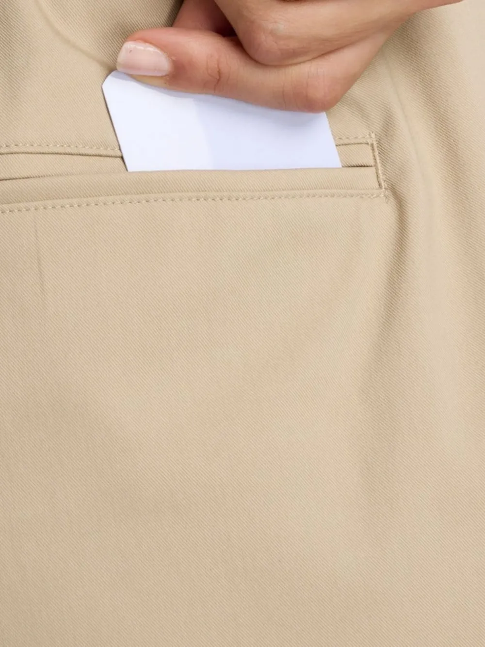 New Balance Boylston geplooide broek Beige