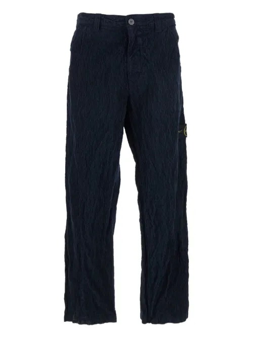 Pantalon en velours côtelé à poches plaquées - Stone Island - Modalova