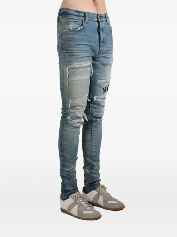 AMIRI Distressed Embroidered Jeans | ブラウン | FARFETCH JP