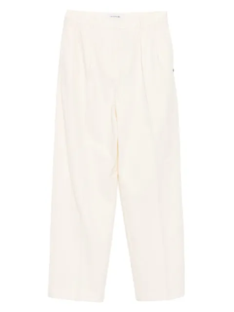 Lacoste pantalones con logo bordado