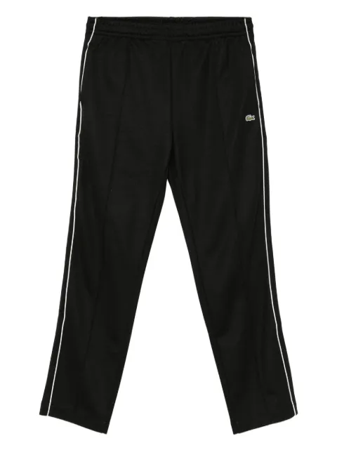 Lacoste pants con parche del logo