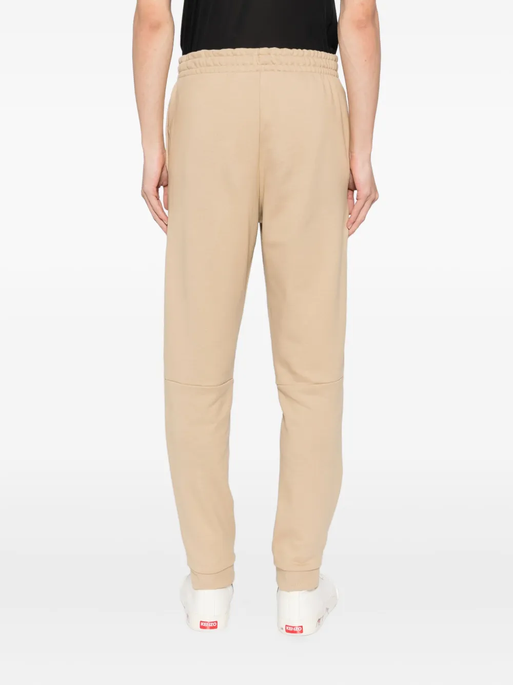 Lacoste Logo-embroidered Trousers In Neutral