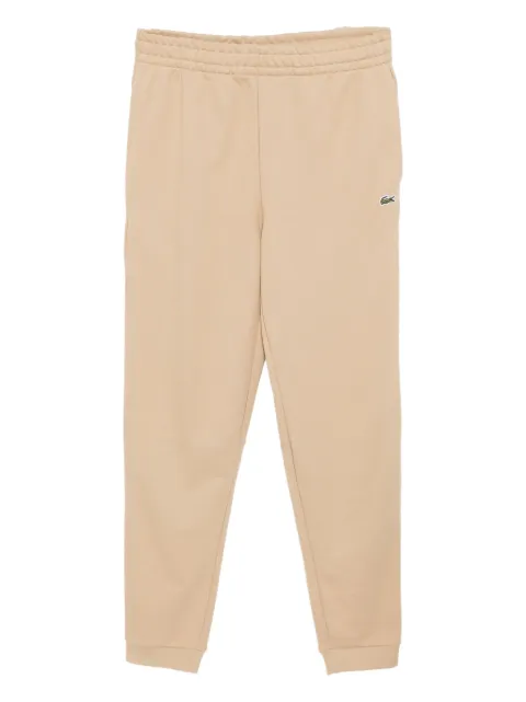 Lacoste pantalones con logo bordado