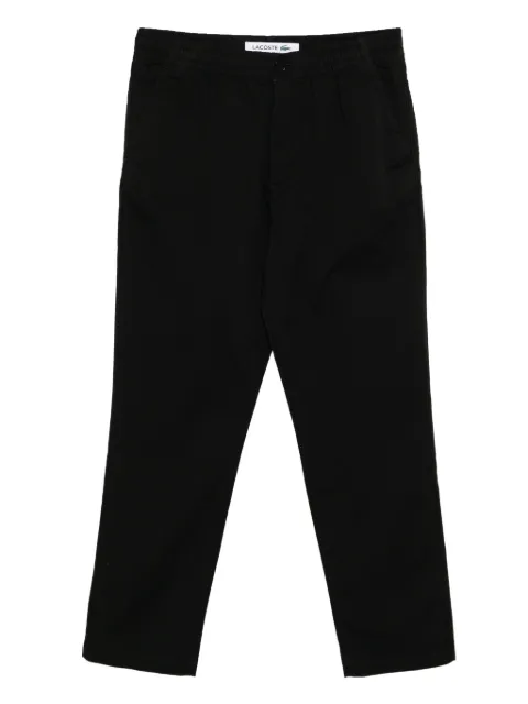 Lacoste pantalones con logo bordado