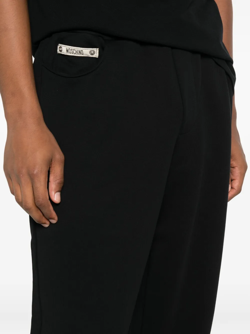 Moschino zip-pocket cuffed trousers Zwart