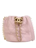 CHANEL Pre-Owned 2021 Mini Quilted Calfskin About Pearls Drawstring bucket bag - Pink