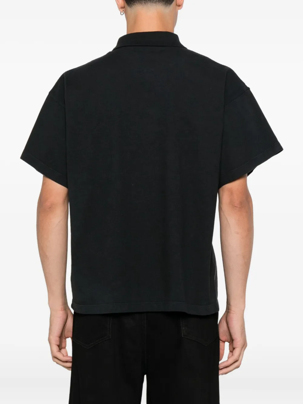 The Row Poloshirt met knopen Zwart