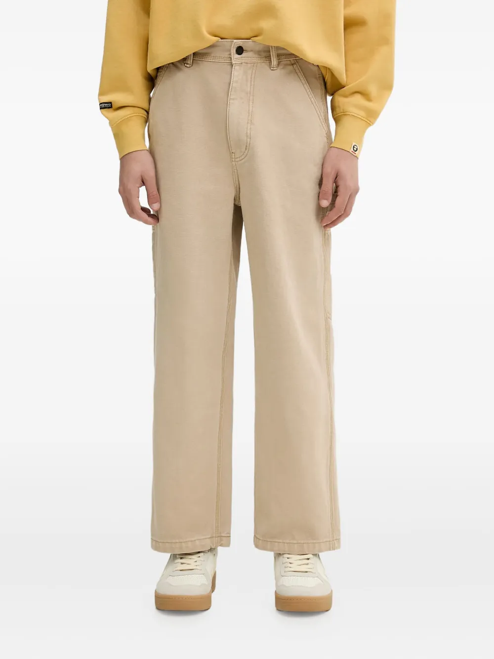 A BATHING APE logo-patch trousers Beige