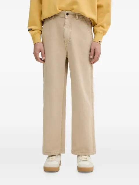 A BATHING APE® logo-patch trousers