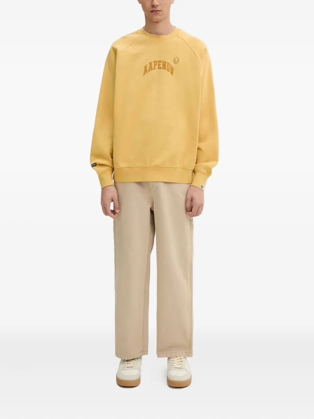 A BATHING APE logo-patch trousers Beige