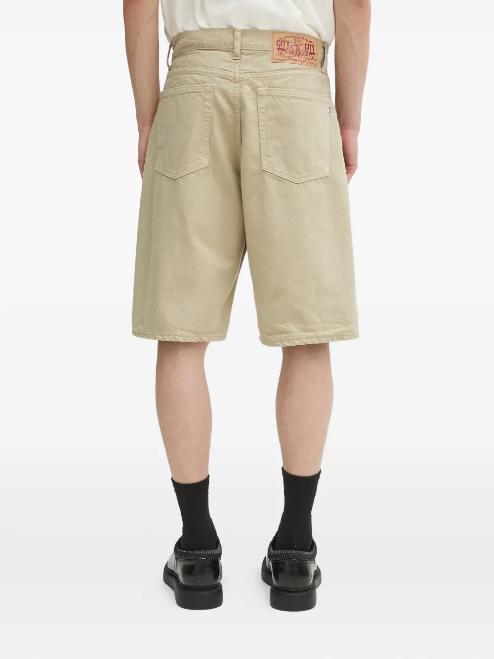 A BATHING APE garment-dyed denim shorts Beige