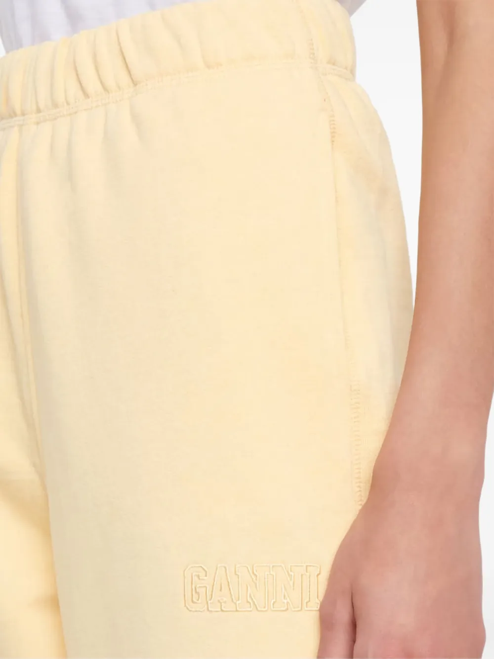 GANNI logo-embroidered track pants Geel