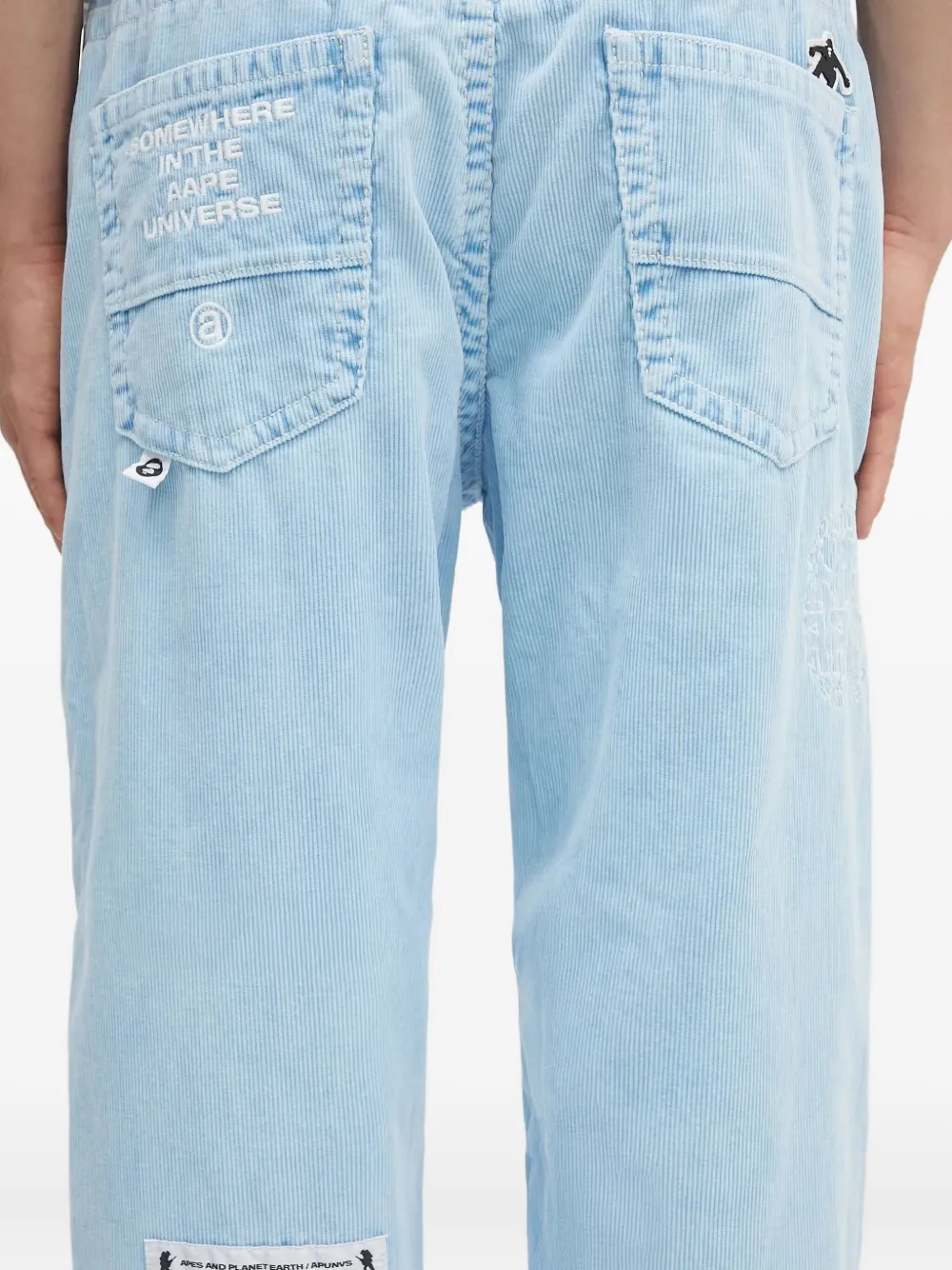 AAPE BY *A BATHING APE logo-embroidered trousers Blauw