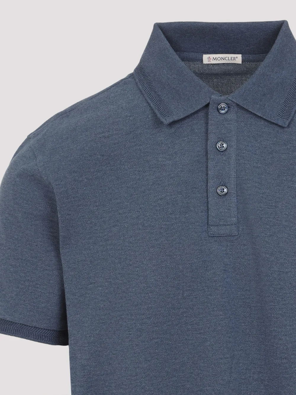 Moncler logo-embroidered polo shirt Blauw