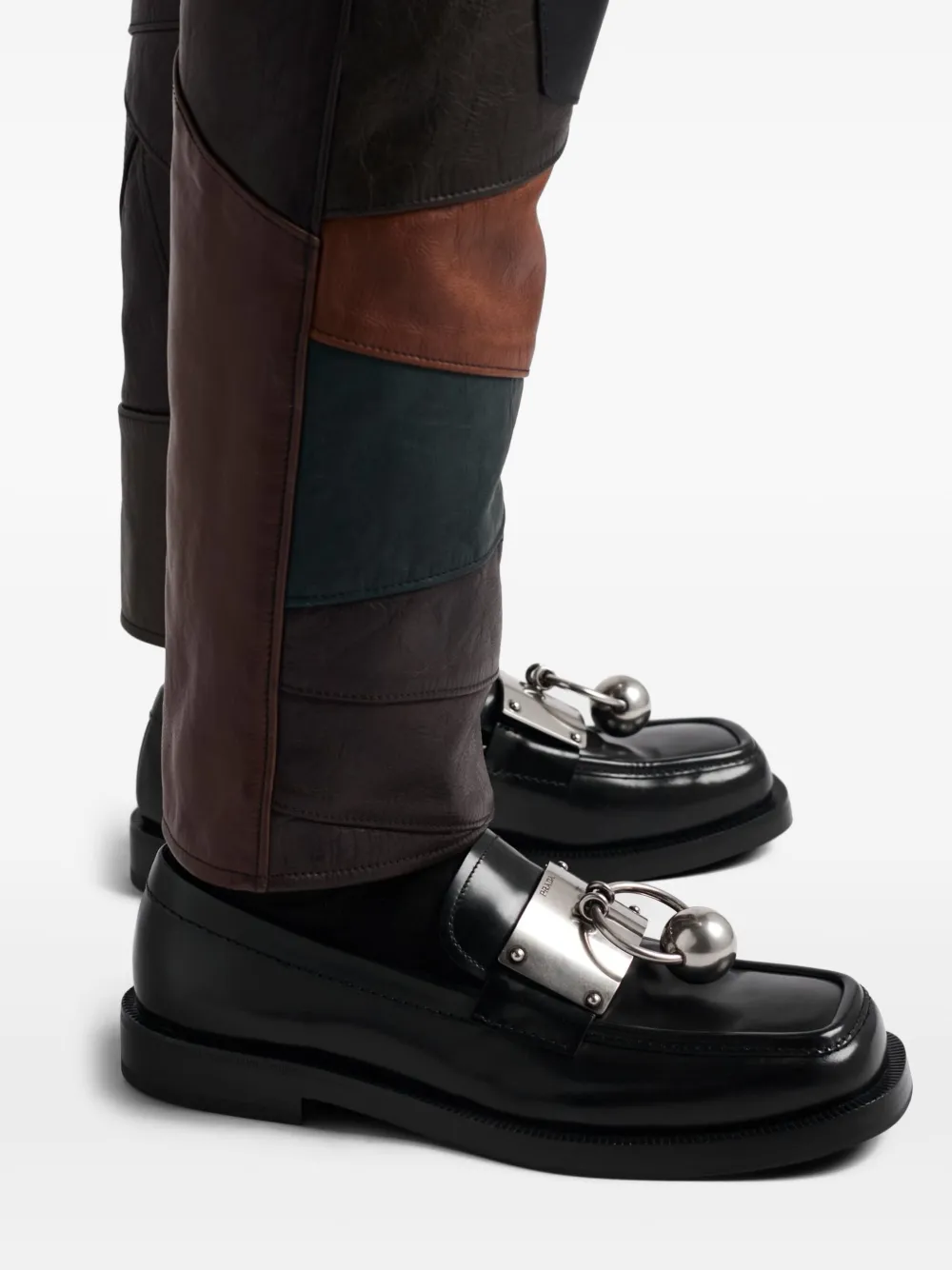 Prada metal-ornament leather loafers Black