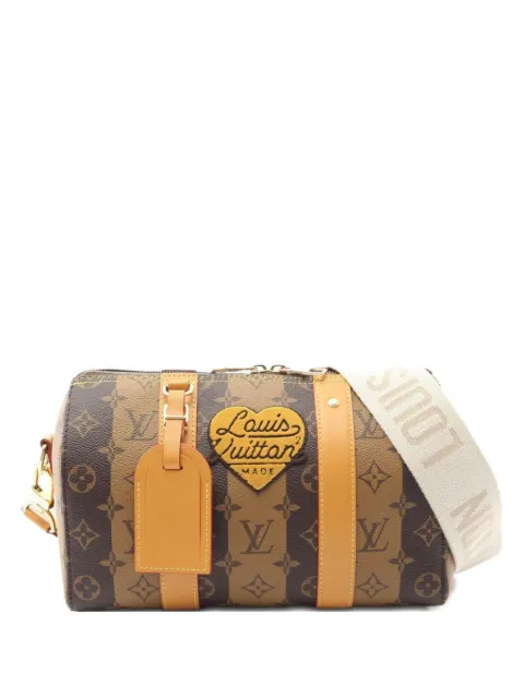 Louis Vuitton Pre-Owned 2021 x Nigo City Keepall stripe shoulder bag