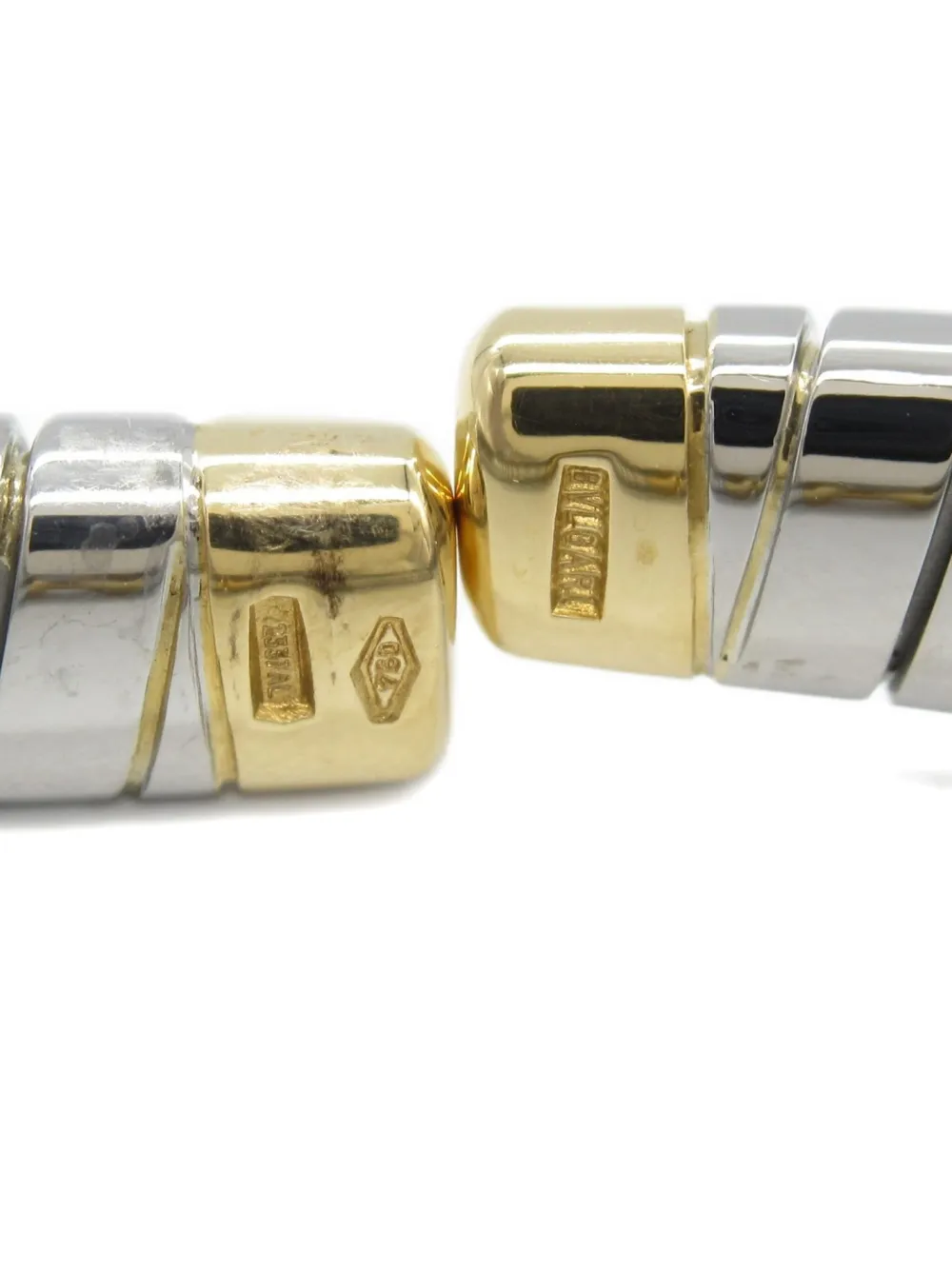 Pre-owned Bvlgari 2010s 18k Yellow Gold Doppio Cuore Spiral Bangle In Silver