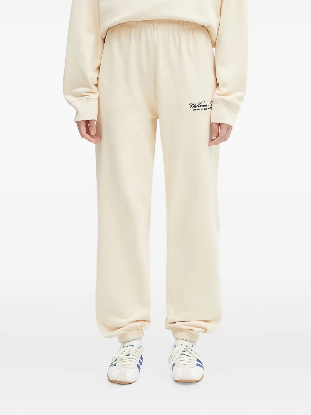 Sporty & Rich embroidered cuffed trousers Beige