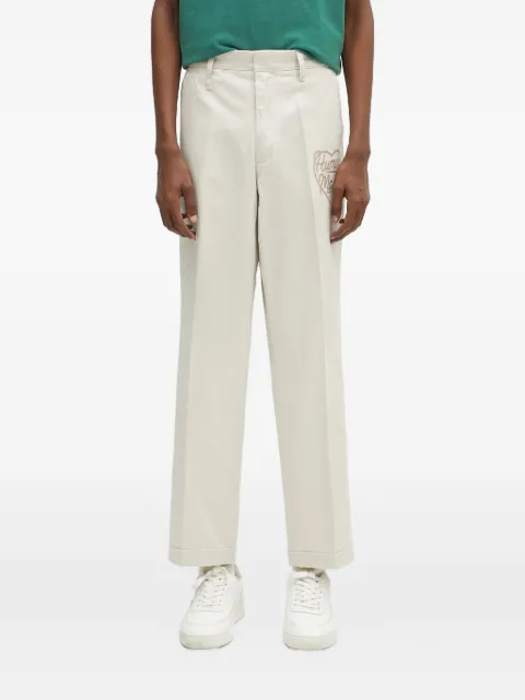 Human Made heart-embroidered pleated trousers