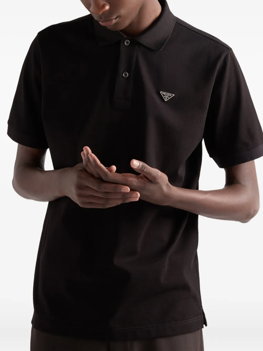 Prada logo-plaque polo shirt Zwart