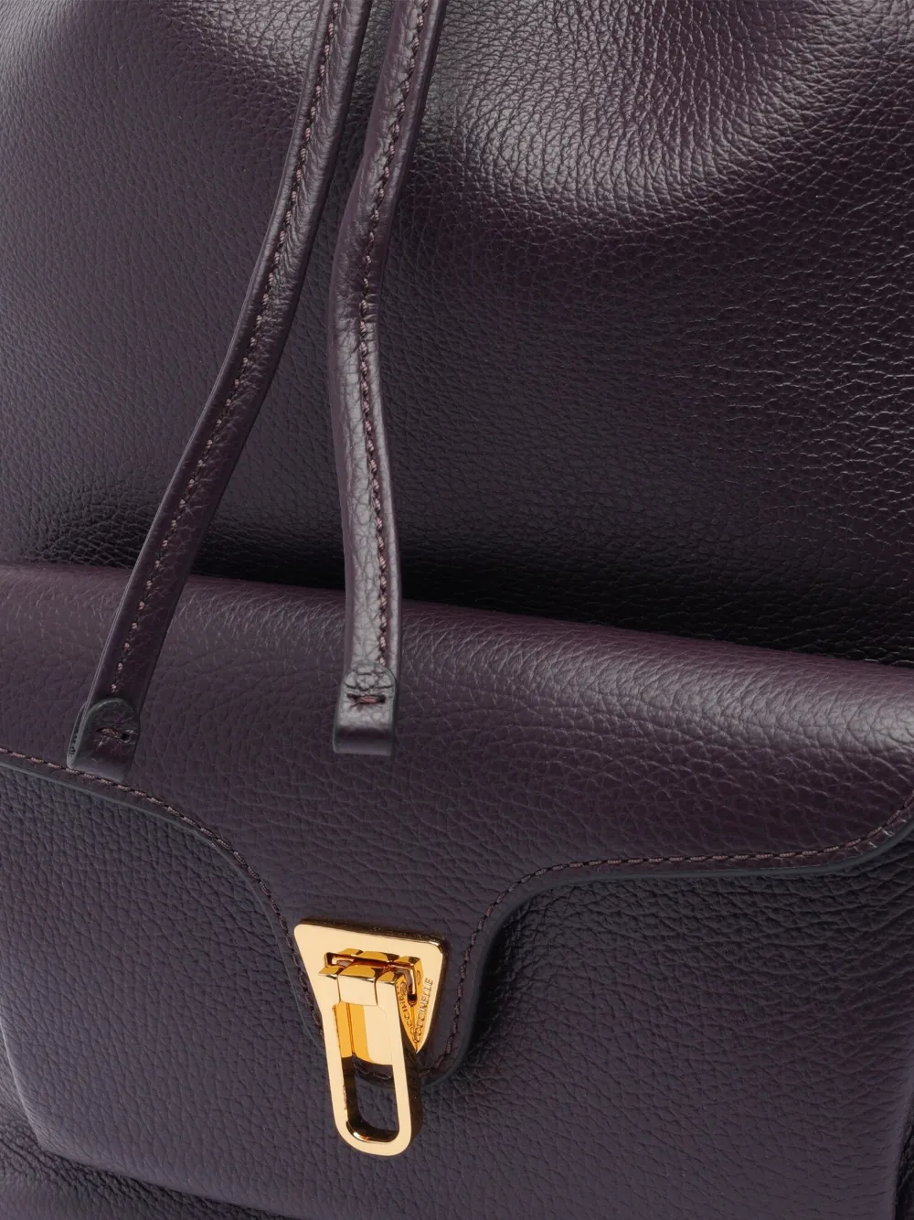 Coccinelle bucket bag drawstring closure Paars