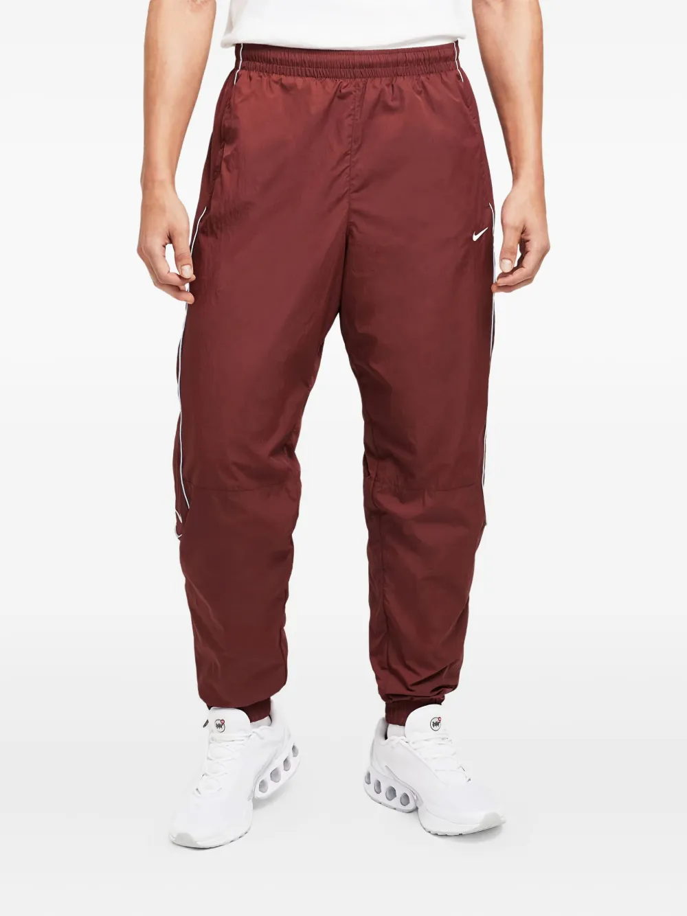Nike Solo Swoosh track pants Bruin