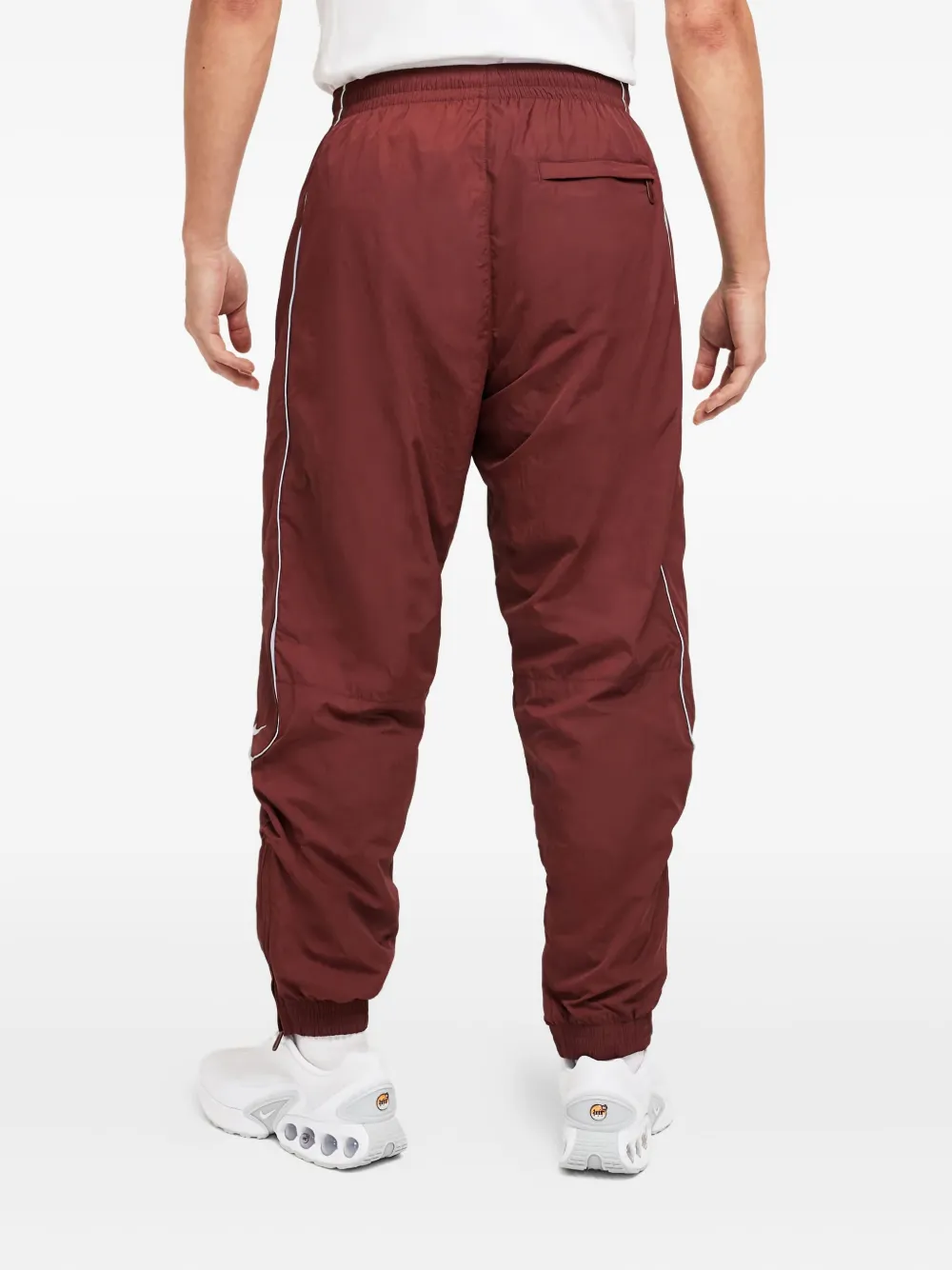 Nike Solo Swoosh track pants Bruin