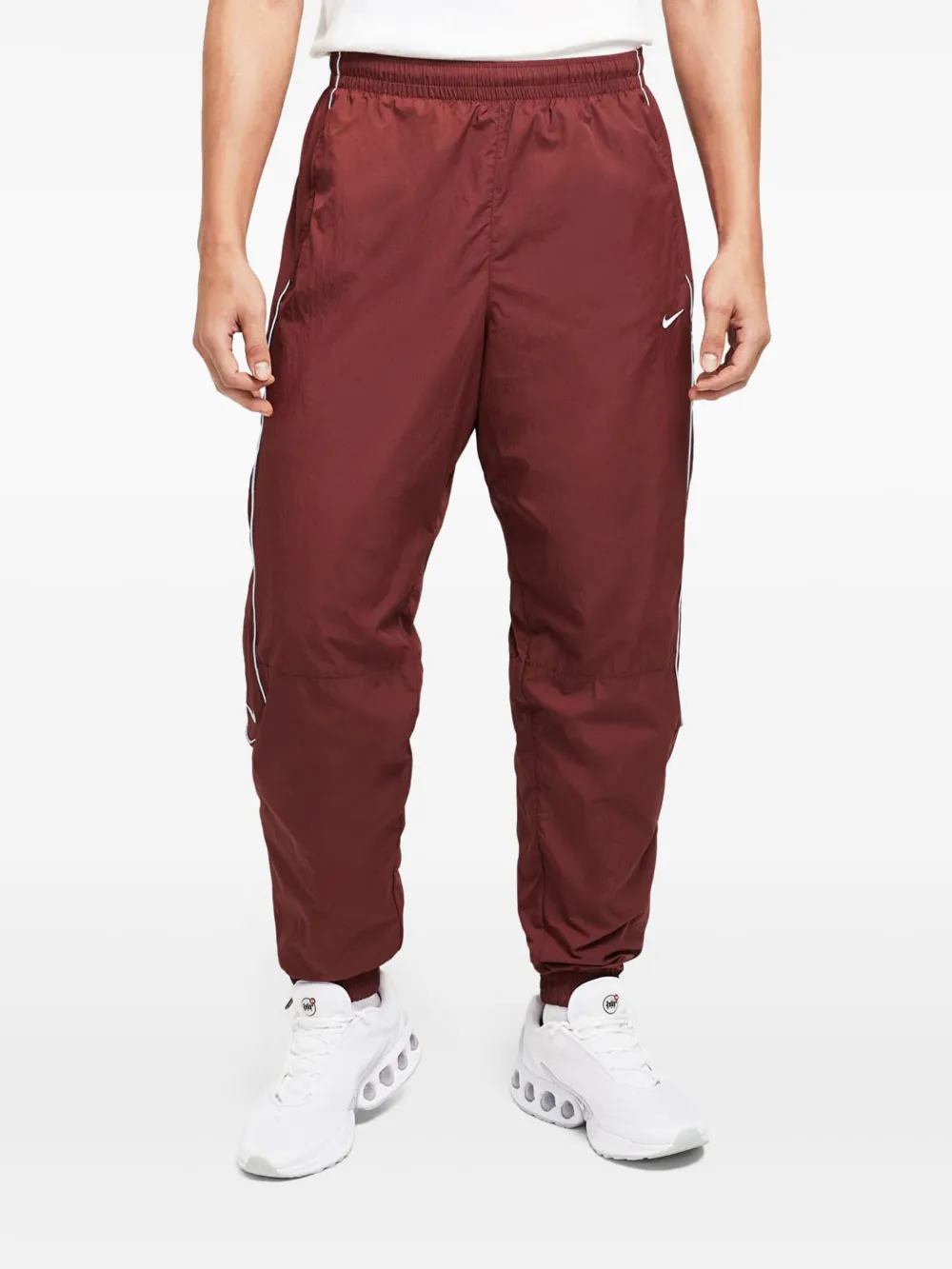 Nike Solo Swoosh track pants Bruin