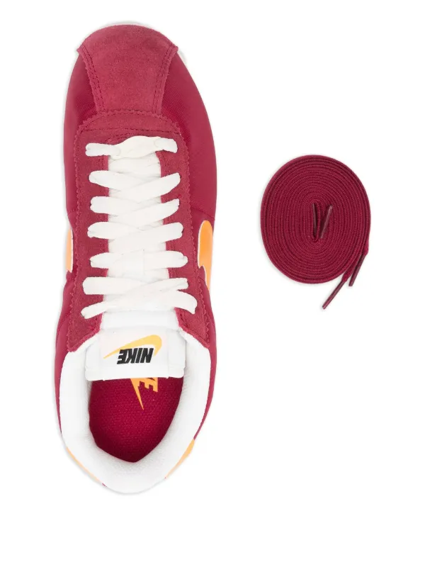 red nike swoosh shoes